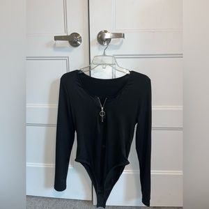 Black thing long sleeve Shein bodysuit with silver zipper. Never worn